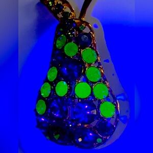 Vintage signed Jackie pear pin with uranium glass rhinestones